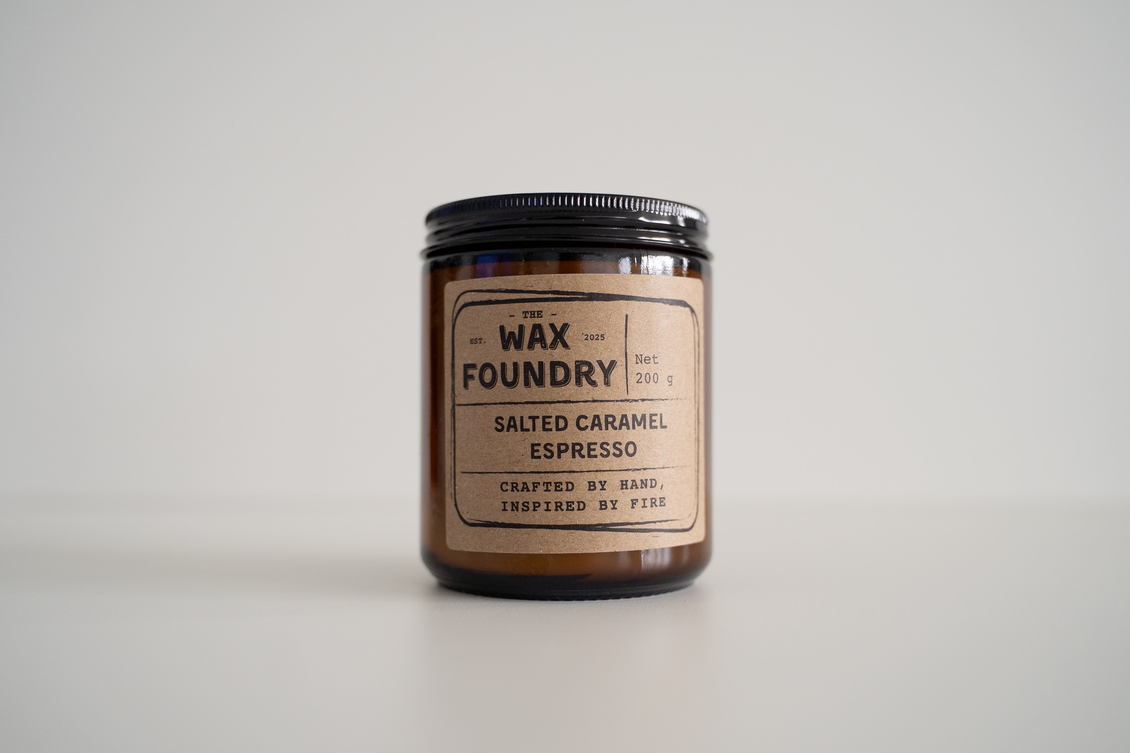 Candle from The Wax Foundry with a label on a white background