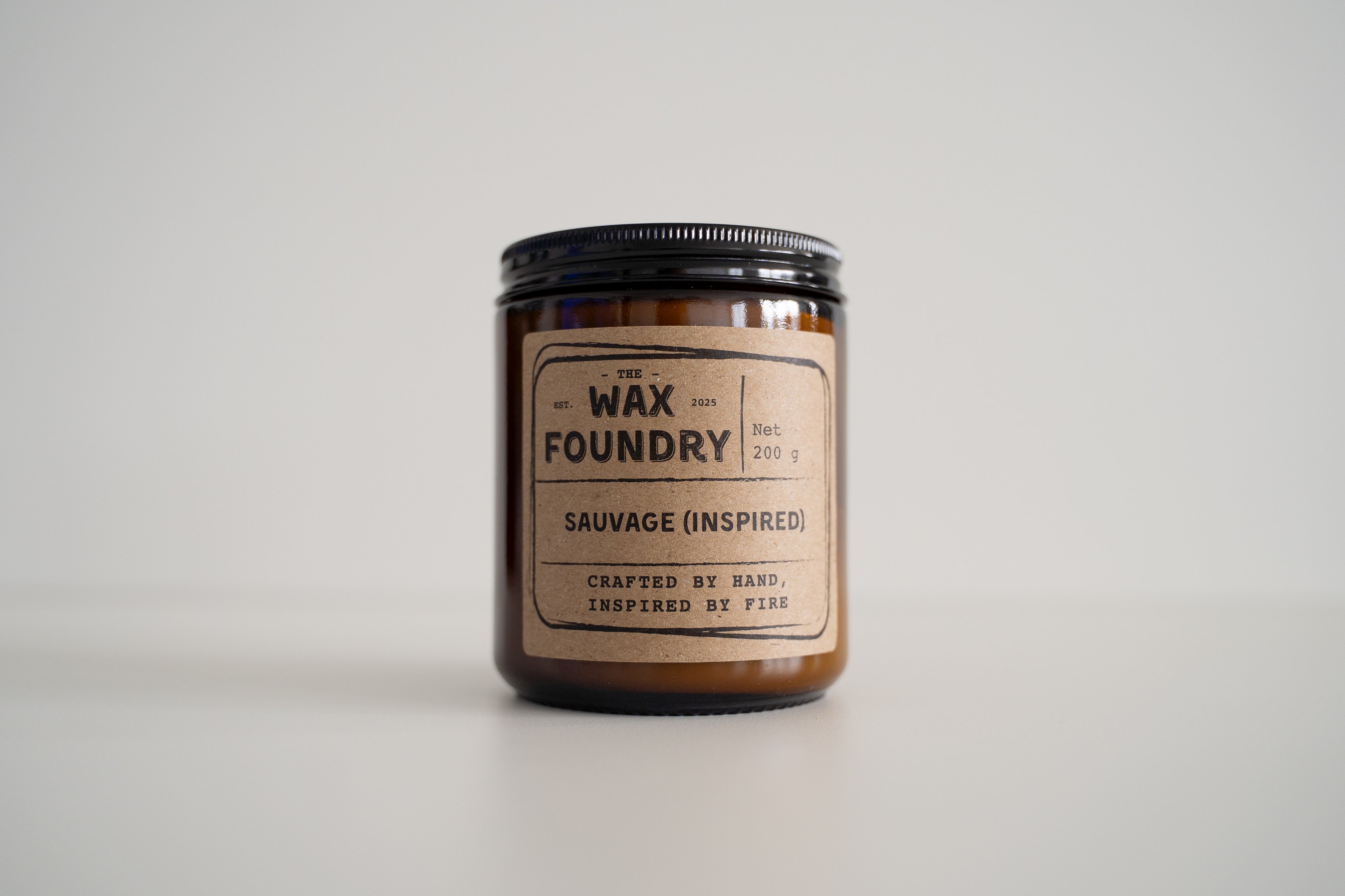 Candle jar from The Wax Foundry on a light gray background