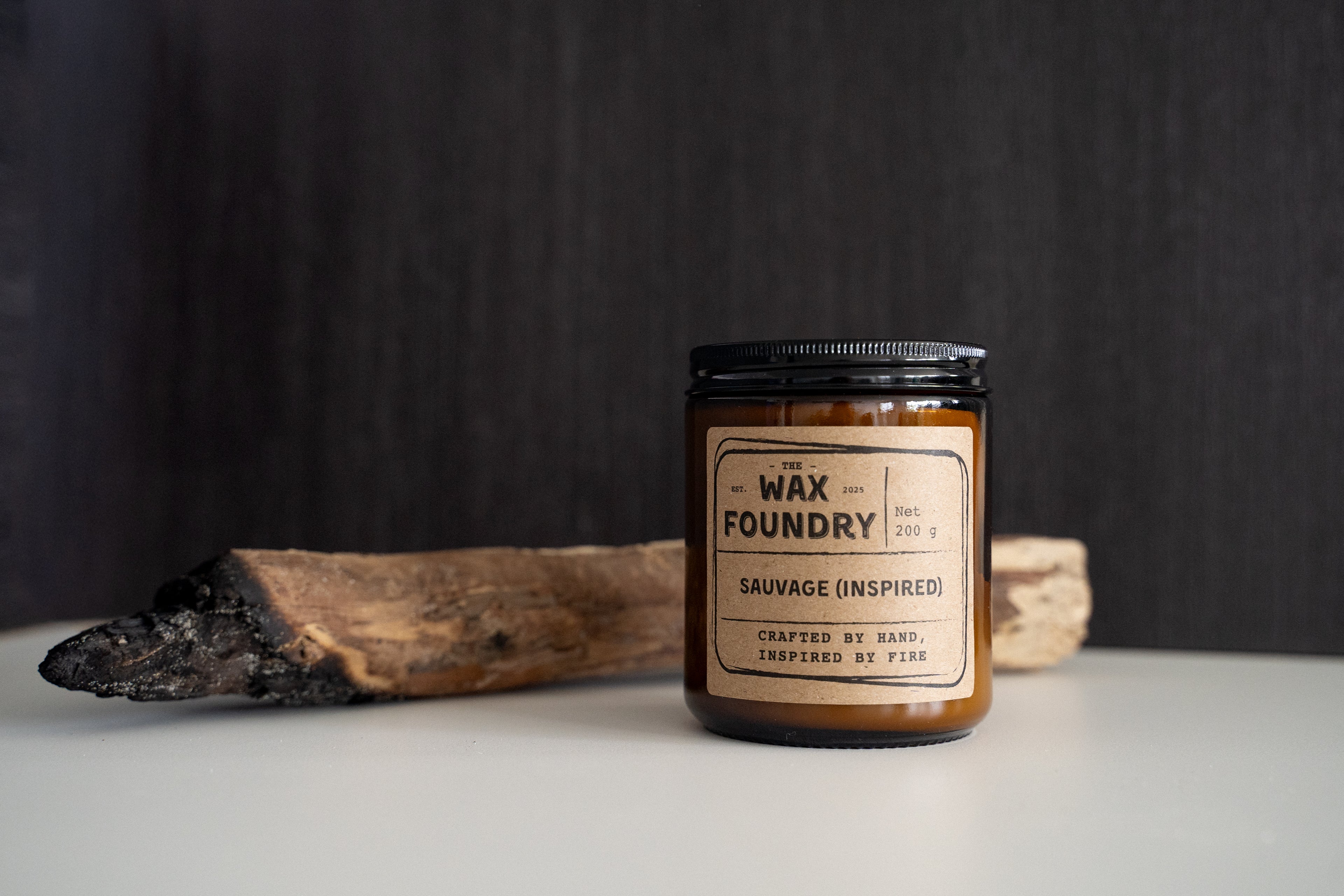 Candle jar from The Wax Foundry on a dark background